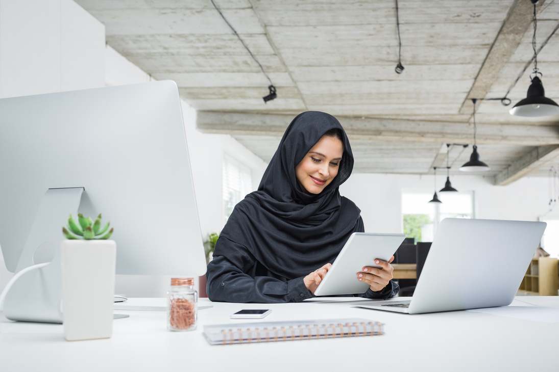 Muslim business woman working in office